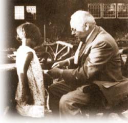 Picture of Alfred Adler with a small child