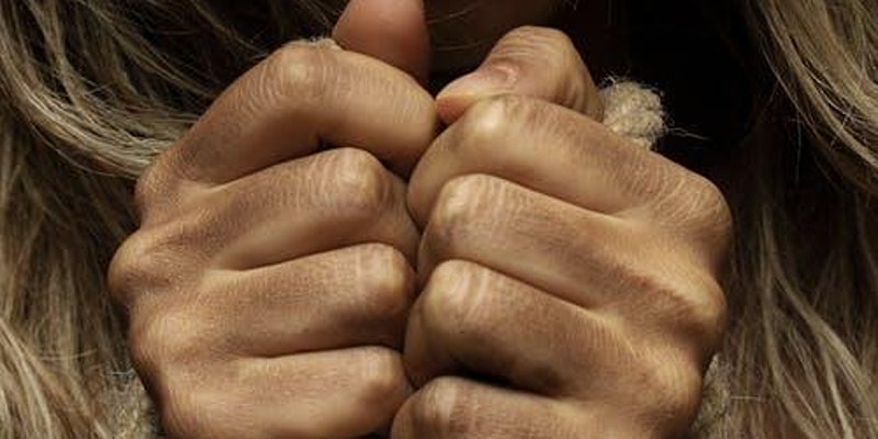close up of hands held together.