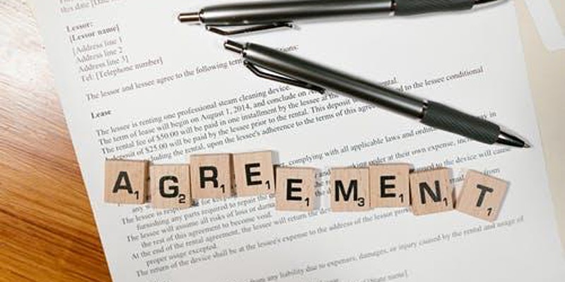 "agreement" spelled with wooden letters