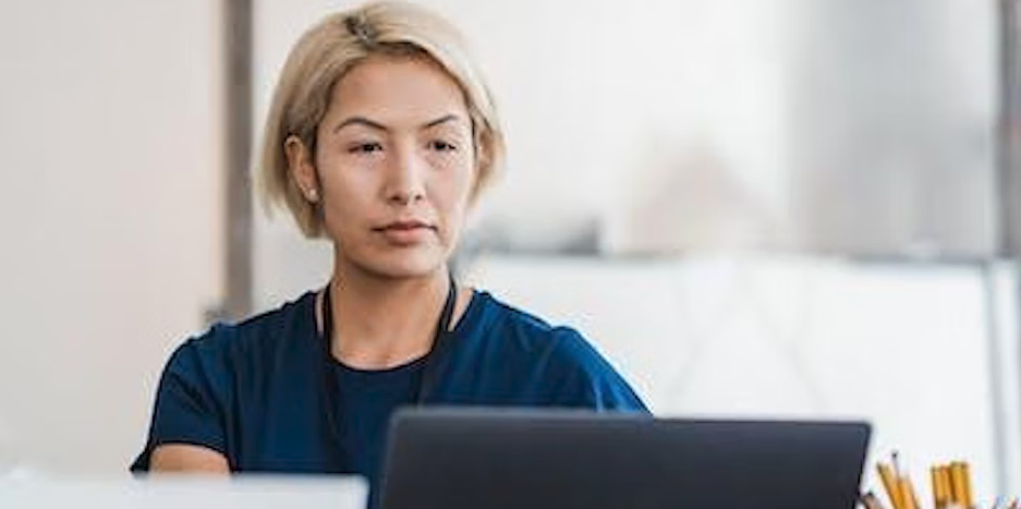 person looking at computer